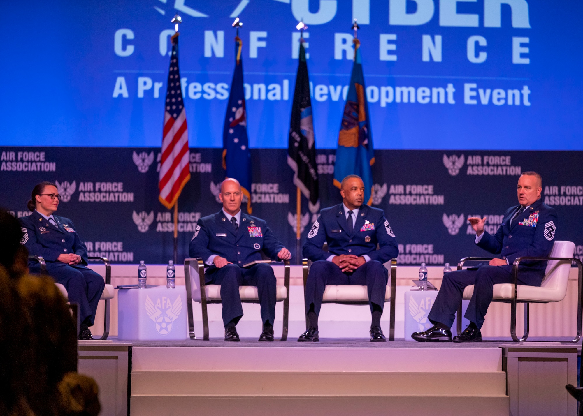 Photo of chief master sergeants speaking during a panel.