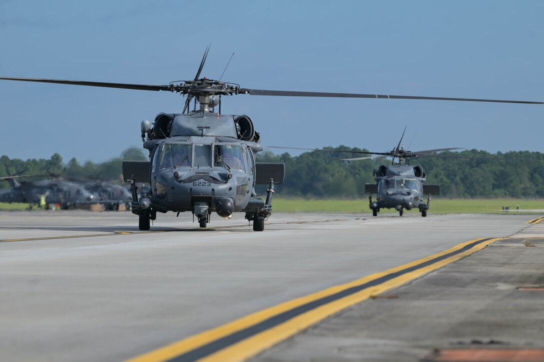 two helicopters taxiing
