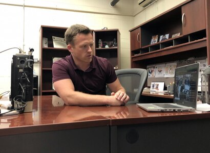 William Wall, shop supervisor at the U.S. Army Medical Materiel Agency's Medical Maintenance Operations Division at Tobyhanna, Pennsylvania, assists in providing telemaintenance support to members of the 51st Medical Logistics Company in July. (Photo Credit: Rachel Mummau)