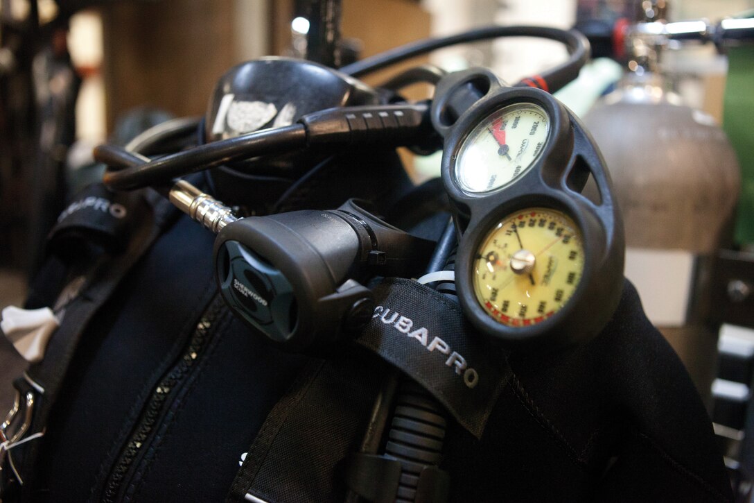 Scuba equipment awaits inspection at Tsunami Scuba at Camp Foster June 1. If equipment maintenance is neglected, it can contribute to malfunctions like broken seals and air pressure loss.