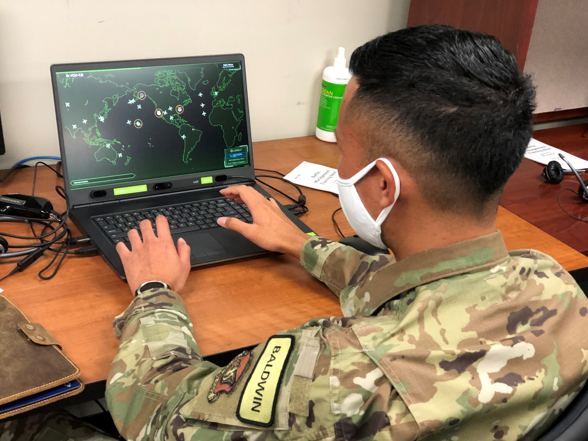 Airman working on a computer