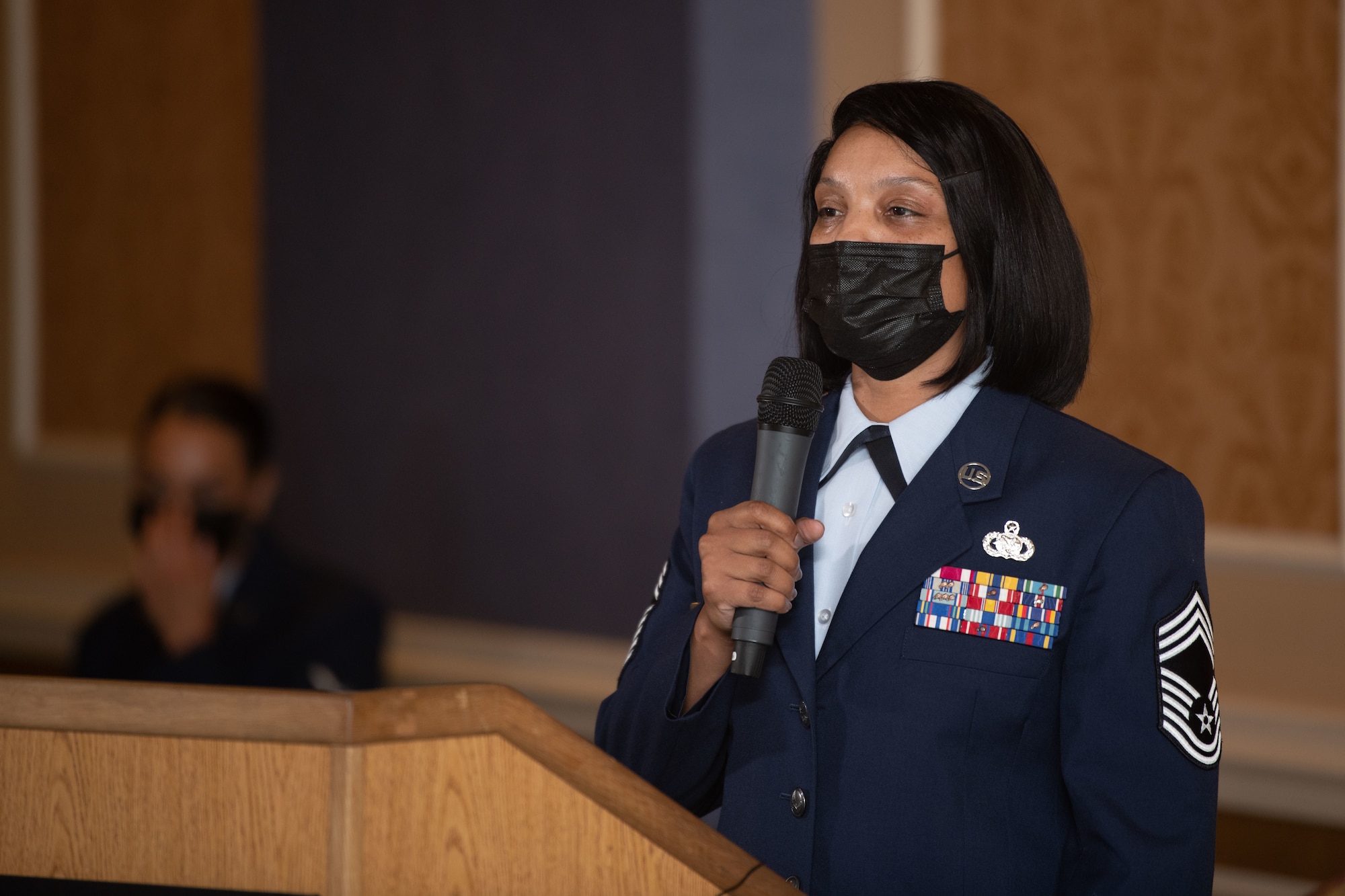 Chief Master Sgt. Lawanda Jackson, 192nd Support Squadron Mobility Flight chief, addresses the audience in attendance at her promotion ceremony on July 10, 20221, at Joint Base Langley-Eustis, Virginia. She was the first Black woman to be promoted to chief in the history of the Virginia Air National Guard. (U.S. Air National Guard photo by Tech. Sgt. Eugene Silvers)