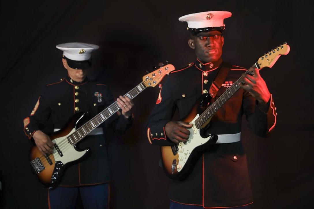 U.S. Marines with the Parris Island Marine Band play the electric and bass guitar aboard Marine Corps Recruit Depot Parris Island, South Carolina, April 10, 2021. Portraits of band members were taken in support of the Musicians Enlistment Option Program.