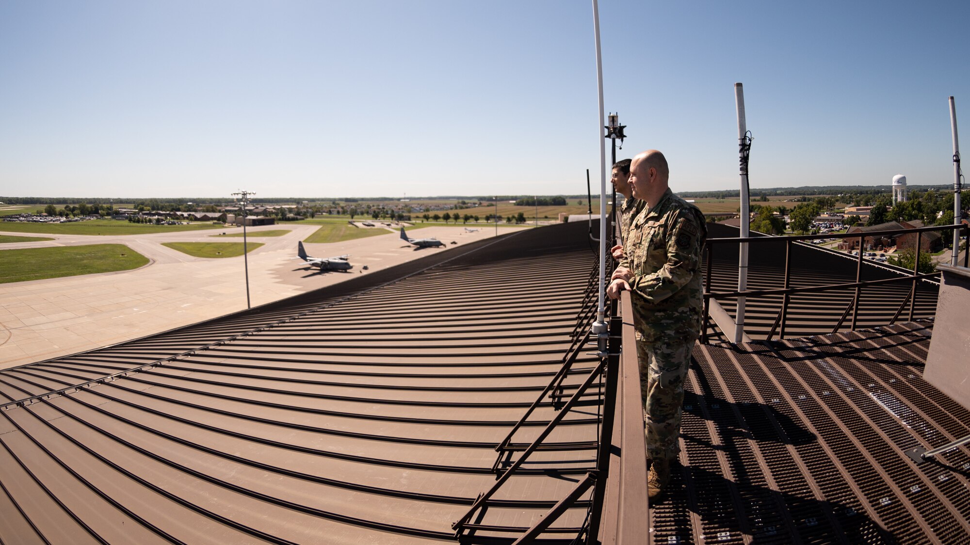 U.S. Air Force Tech. Sgt. Anthony Cooper, 375th OSS NCOIC of airflow manager operations, and Senior Airman Samir Ragih, 375th Operation Support Squadron airfield management shift lead, evaluate the runway on Scott Air Force Base, Illinois Sept. 8, 2021. The airfield management Airmen have to ensure that they focus on the attention to detail aspect of their skillset when evaluating the runway to catch potential hazards, or emergencies. (U.S. Air Force Photo by Airman 1st Class Isaac Olivera)