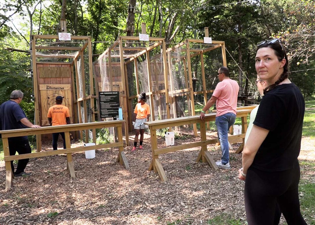 Army Corps of Engineers Nashville District employees receive their safety briefing from the staff at the Adventure Park in Nashville, Tennessee, before beginning a friendly ax throwing competition as their final team building exercise for the LDP II program.