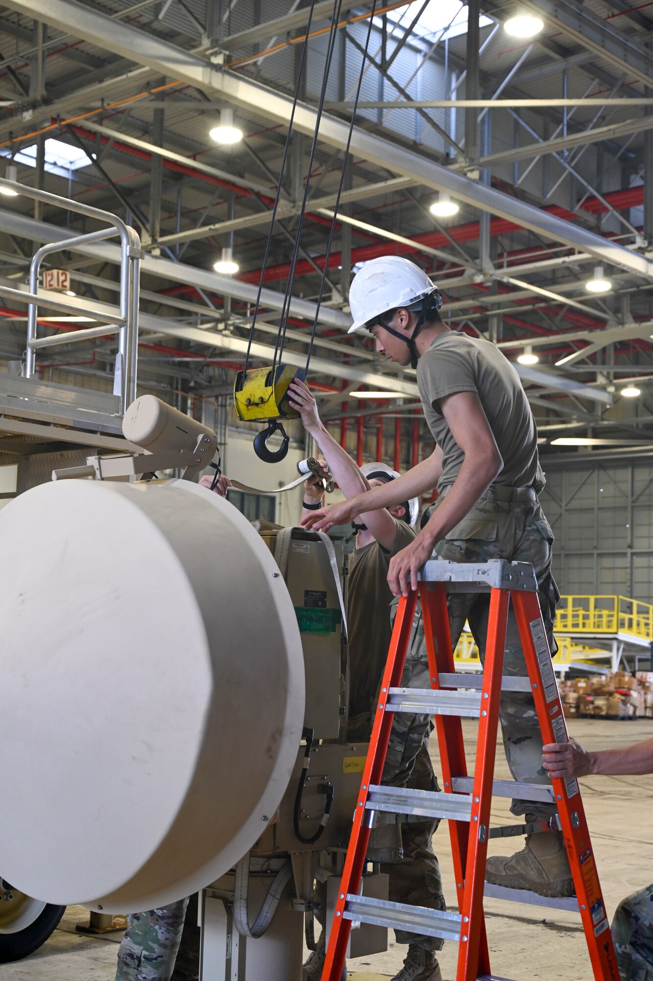 A1C Jason Swan 49 Aircraft maintenance squadron ground control station technician Sept. 9, 2021 on Marine Corps Base, Hawaii. The equipment is disassembled to transport via airlift and then reassembled at the operating location. (U.S. Air Force photo by Airman 1st Class Adrian Salazar)