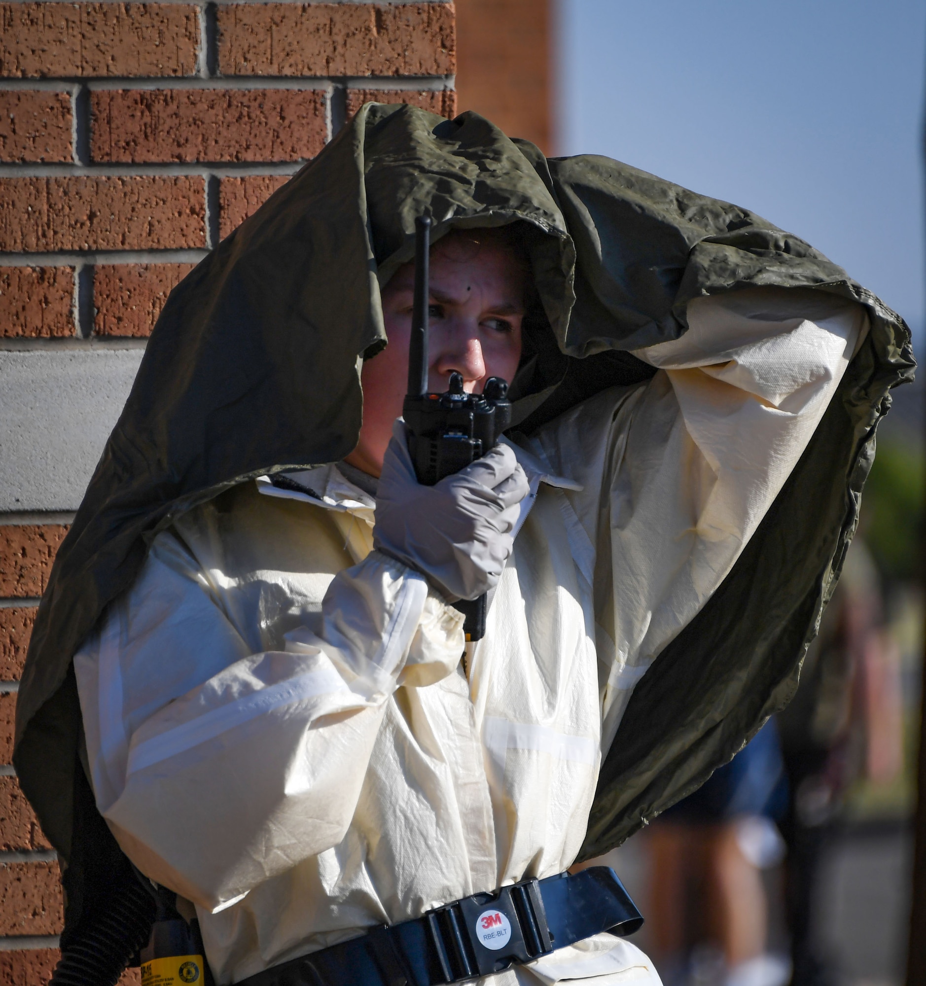 Airman 1st Class Belle Ress communicates with medical control center