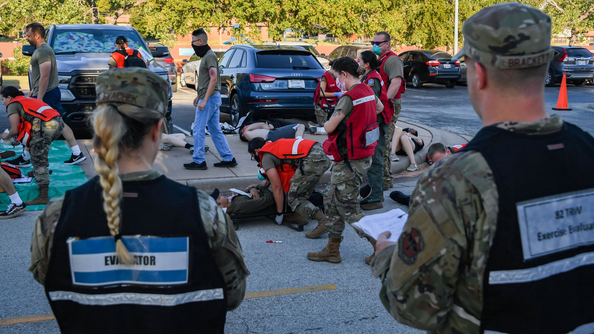 Evaluators watch as personnel from the 82nd Medical Group take care of patients during a Ready Eagle exercise