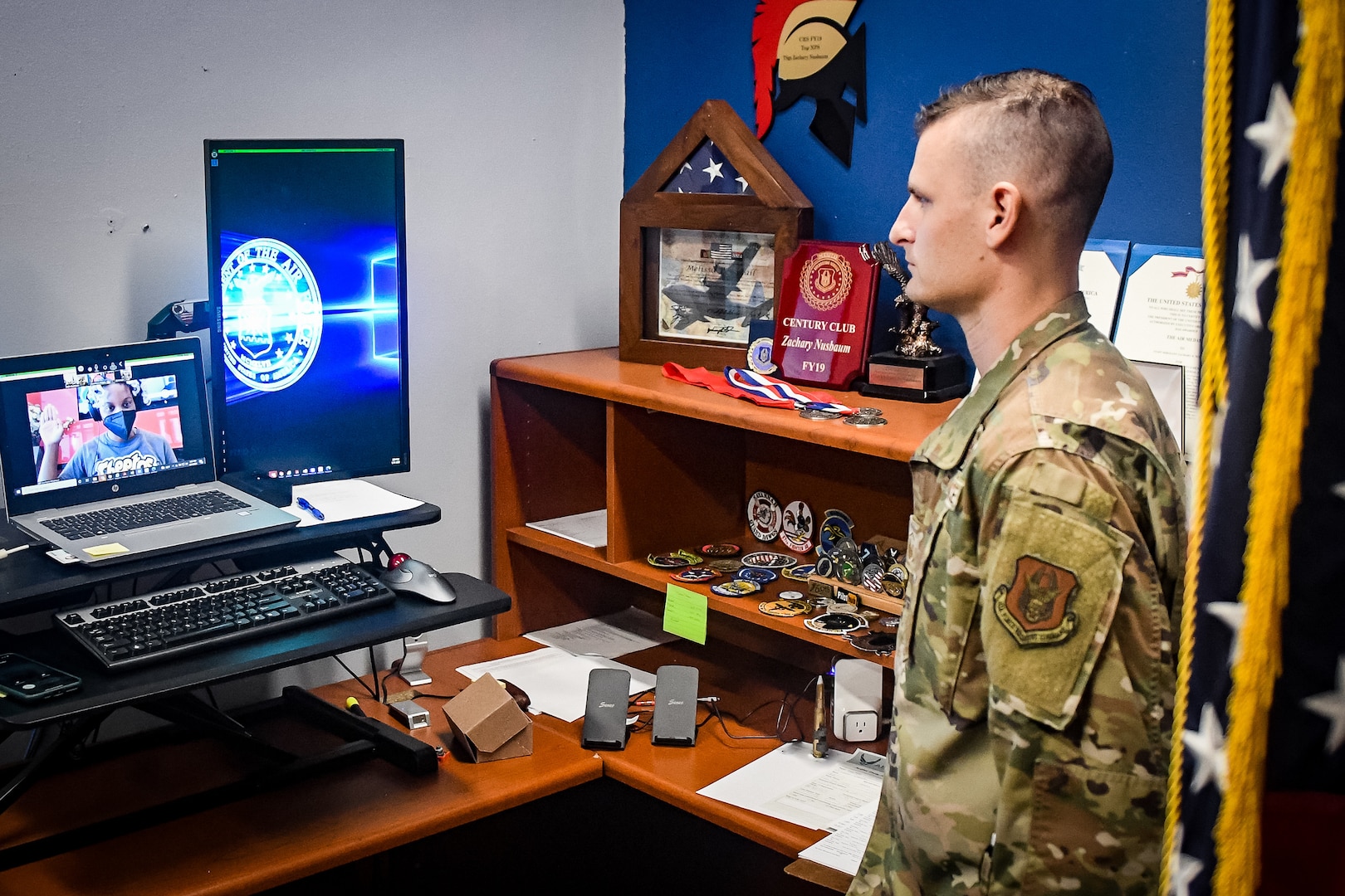 Air Force Reserve recruiter witnessing a reenlistment ceremony.