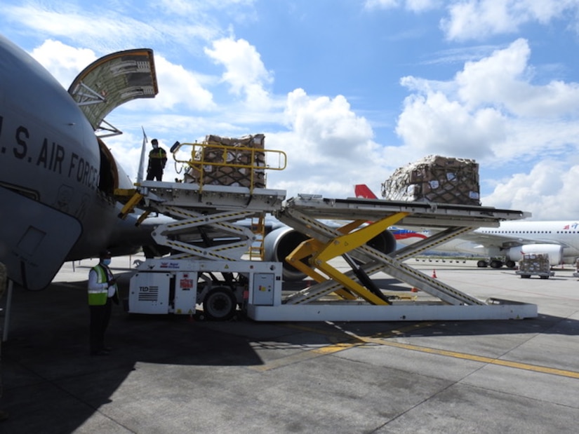 Medical supplies to help aid Nepal’s COVID-19 response are offloaded from a KC-135 Stratotanker from the Utah National Air Guard.