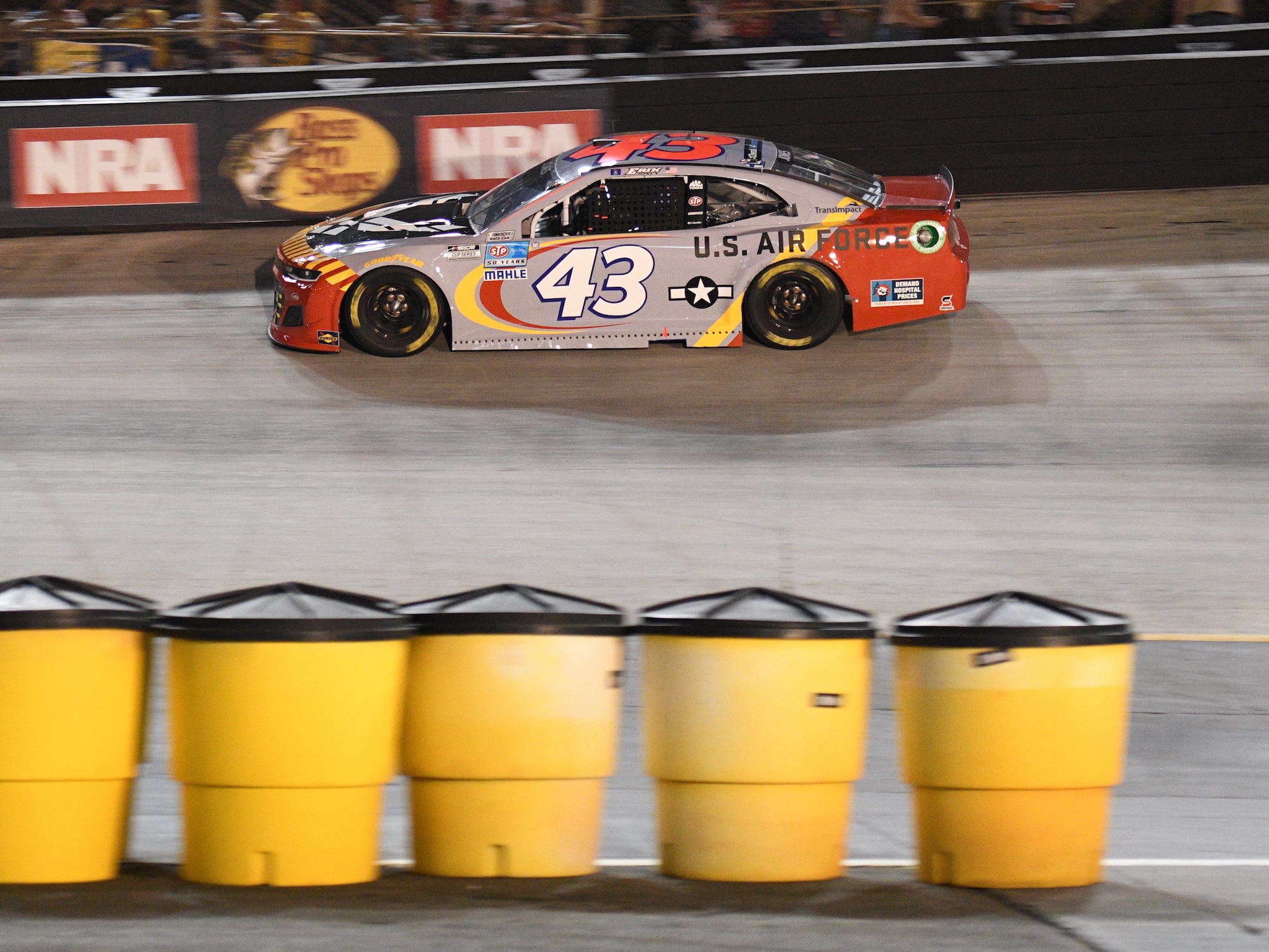 The Air Force-sponsored No. 43 racecar enters a straightaway at Bristol Motor Speedway, Bristol, Tennessee during the Bass Pro Shops NRA Night Race NASCAR Cup Series.
