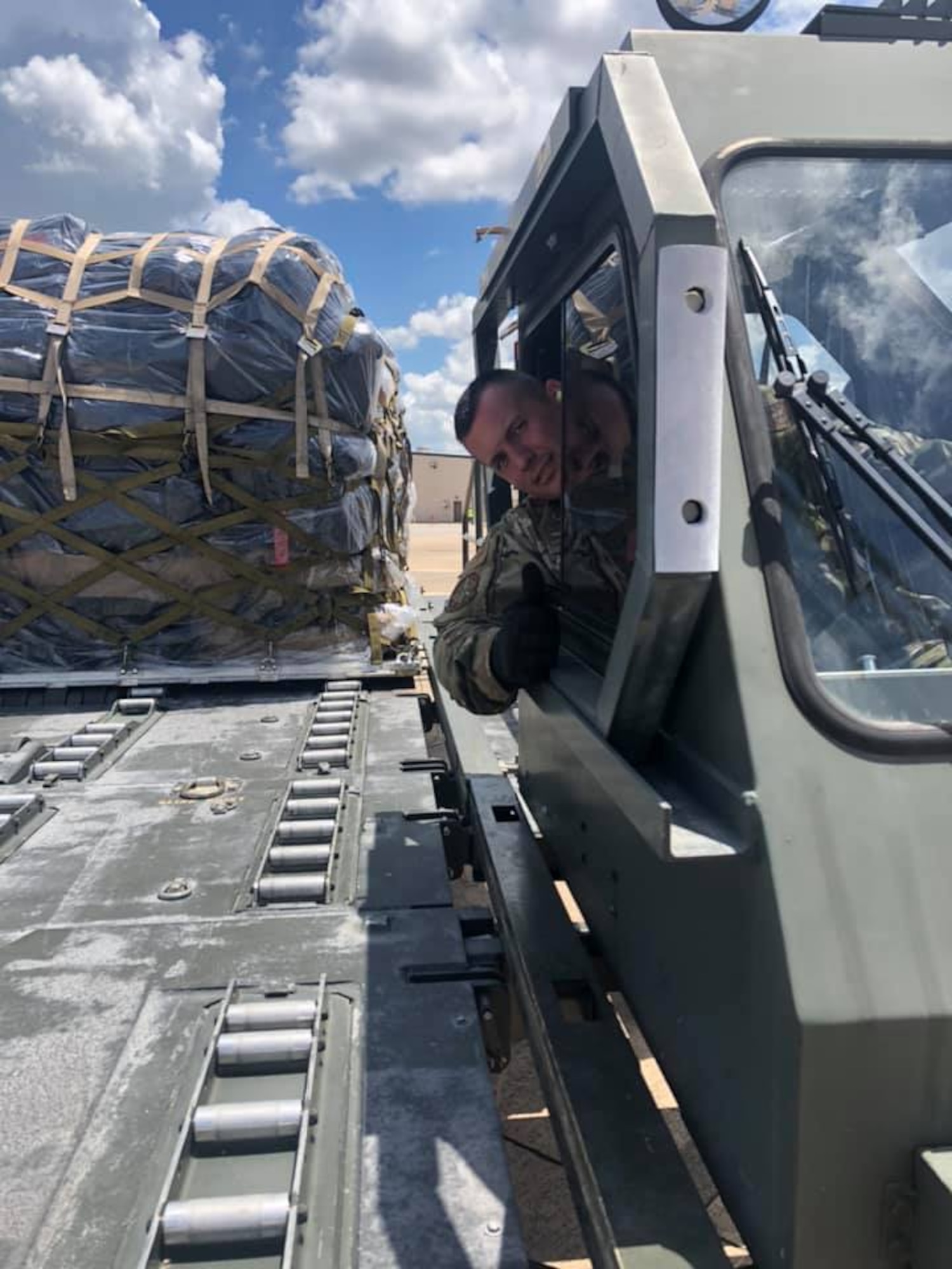 Tech. Sgt. Sean Hill, 73rd Aerial Port Squadron Special Handling Supervisor, operates a 25K loader at Naval Air Station Joint Reserve Base Fort Worth, Texas. The 73d APS are affectionately known as Port Dawgs. (courtesy photo)