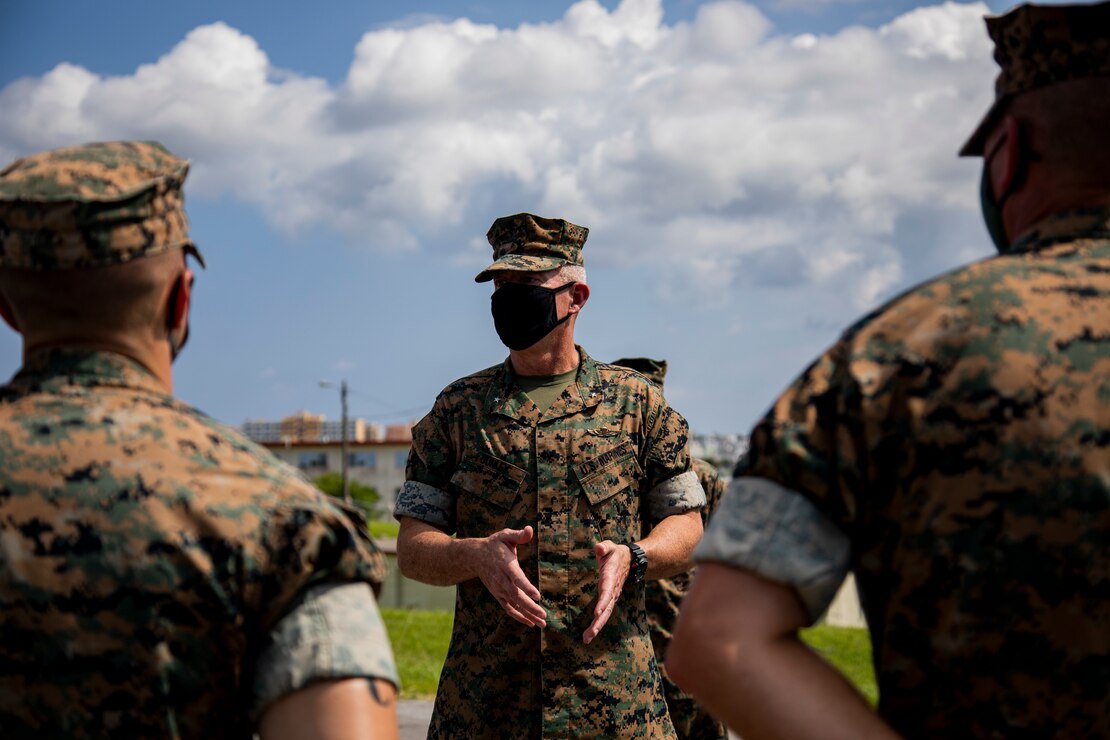 U.S. Marine Corps Brig. Gen. Daniel B. Conley, commanding general of Marine Corps Installations Command (MCICOM), speaks to Marines while conducting an air station tour of Marine Corps Air Station Futenma, Okinawa, Japan, Sept. 21, 2021. Since taking command of MCICOM, this is the first time Conley has visited Okinawa and Marine Corps Installations Pacific headquarters. (U.S. Marine Corps photo by Lance Cpl. Shelby A. Karr)