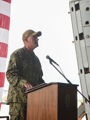 SASEBO, Japan (Sept. 23, 2021) Capt. Brian Schrum, departing commanding officer of USS New Orleans (LPD 18), speaks during his change of command ceremony. New Orleans, part of the America Expeditionary Strike Group, is operating in the U.S. New Orleans, part of the America Expeditionary Strike Group, along with the 31st Marine Expeditionary Unit, is operating in the U.S. 7th Fleet area of responsibility to enhance interoperability with allies and partners and serve as a ready response force to defend peace and stability in the Indo-Pacific region.