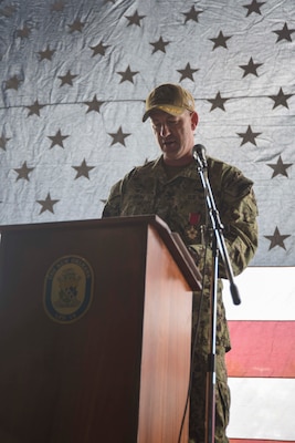SASEBO, Japan (Sept. 23, 2021) Capt. Brian Schrum, departing commanding officer of USS New Orleans (LPD 18), speaks during his change of command ceremony. New Orleans, part of the America Expeditionary Strike Group, is operating in the U.S. New Orleans, part of the America Expeditionary Strike Group, along with the 31st Marine Expeditionary Unit, is operating in the U.S. 7th Fleet area of responsibility to enhance interoperability with allies and partners and serve as a ready response force to defend peace and stability in the Indo-Pacific region.