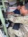 Dan Guzman, a U.S. Army Aviation and Missile Command Logistics Assistance Representative assigned to the 405th Army Field Support Brigade, assists a Soldier from Headquarters and Headquarters Troop, 2nd Cavalry Regiment with uploading system software updates on the Air and Missile Defense Workstation. Highly trained, LARs are Army civilians serving in motor pools, hangars, maintenance shops and offices around the world. They are part of the U.S. Army Sustainment Command’s global network of Army Field Support Brigades and are linked to every echelon of the Army in the field. (U.S. Army Courtesy photo)