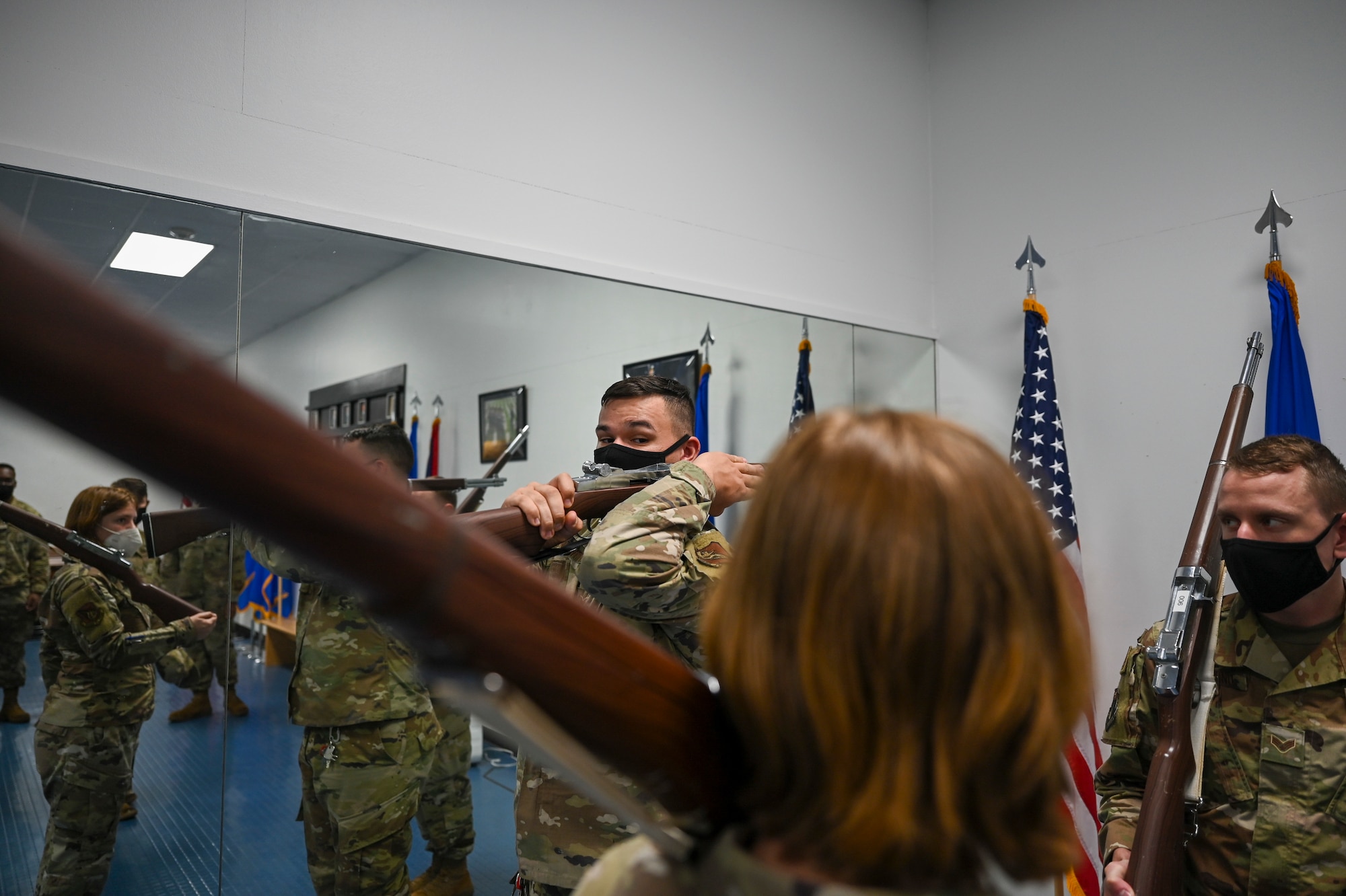 U.S. Air Force Senior Airman Cody Chenowith, pavements and equipment journeyman assigned to the 36th Civil Engineer Squadron, demonstrates proper form and technique during honor guard practice at Andersen Air Force Base, Guam, Aug. 25, 2021. Training helps ensure honor guardsmen display precision and professionalism when called upon to serve the community.  (U.S. Air Force photo by Tech. Sgt. Esteban Esquivel)