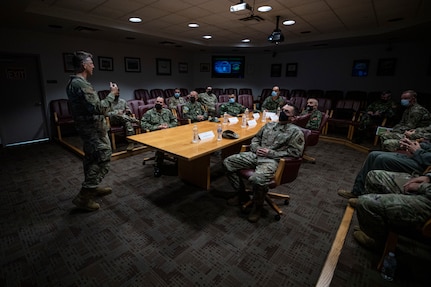 U.S. Air Force Brig. Gen. Bradford R. Everman, New Jersey Air National Guard Chief of Staff, left, briefs members of the Albanian Armed Forces during a tour of the 108th Wing on Joint Base McGuire-Dix-Lakehurst, N.J., Sept. 23, 2021.