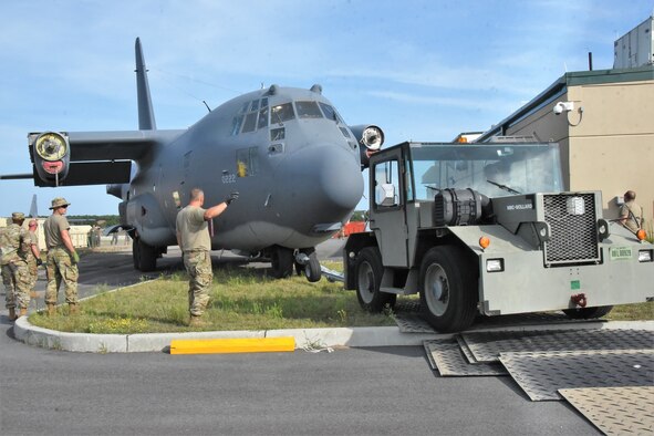 “The Spirit of Long Island” HC-130 Hercules aircraft, tail number 0222, which saw service during the Vietnam War and later assigned to the New York Air National Guard 106th Rescue Wing located at Francis S. Gabreski Air National Guard Base, Westhampton Beach, New York, until its decommissioning in 2019, is moved from the flight line to its static display site at the entrance of the base on, August 16, 2021. The disassembling and move was completed by Air National Guard service members from New York, Connecticut, Arkansas, and US Air Force Active-duty personnel. (U.S Army National Guard photo by New York Guard Cpt Mark Getman)