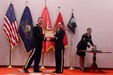 Maj. Rhyan Kleiner, Officer Candidate School (OCS) Commander, 166th Regiment shakes hands with 2nd Lt. Aubrey Stuber as she received the Erickson Trophy as the distinguished honor graduate for her leadership potential and academic performance Aug. 8, 2021, at Fort Indiantown Gap. 2nd Lt. Rhiannon Swartz received 2nd honors, 2nd Lt. Casey Sullivan received 3rd Honors and 2nd Lt. Sean McClain received the highest average leadership evaluation. (U.S. Army National Guard photo by 1st Lt. Amanda Westlund)