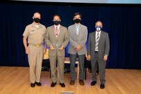 Naval Surface Warfare Center, Carderock Division Commanding Officer Capt. Todd E. Hutchison, Signatures Department Head Paul Shang and Technical Director Larry Tarasek present the Rear Adm. George W. Melville Award