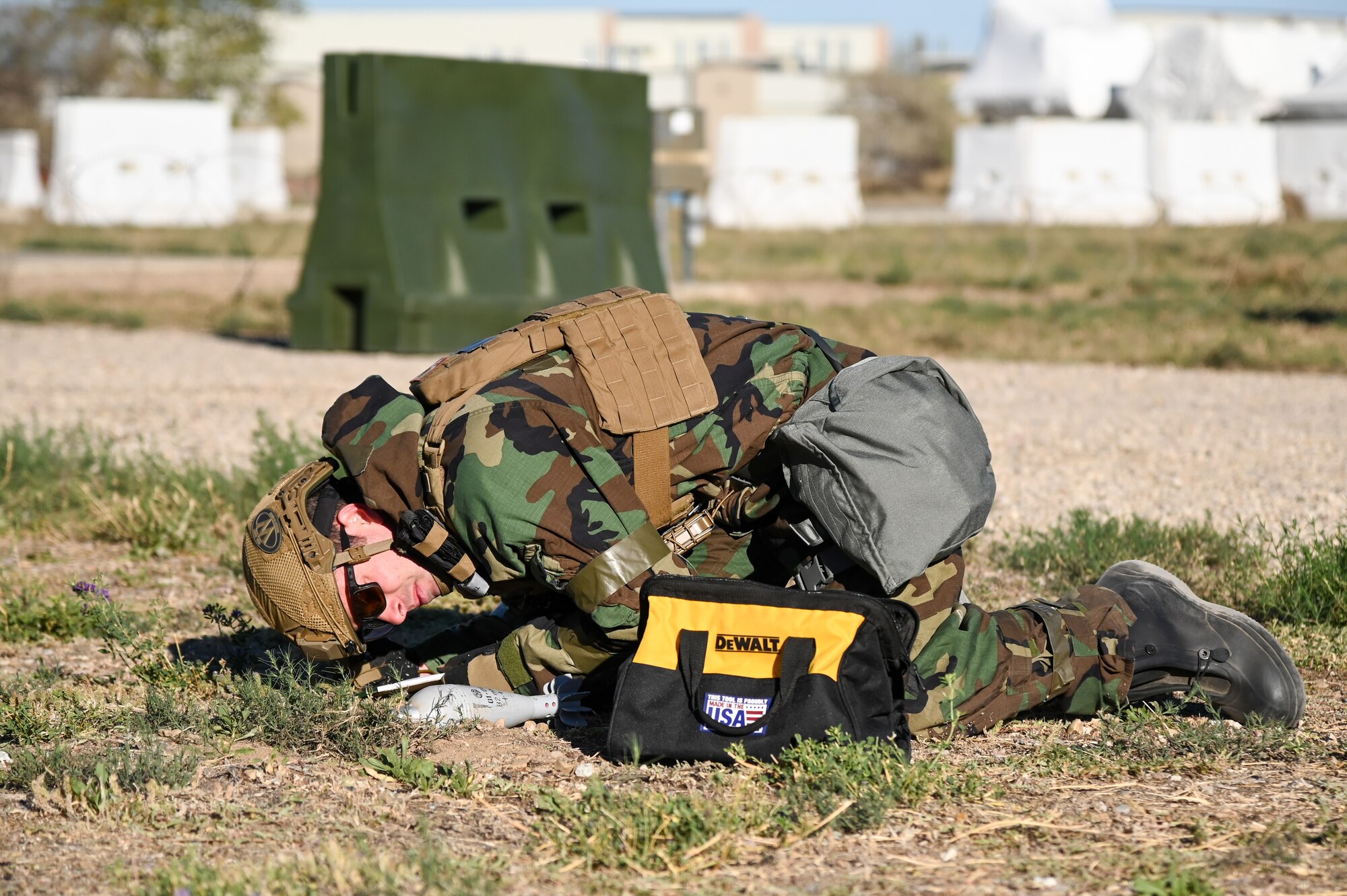Staff Sgt. Kaleb Marquis, 775th Explosive Ordnance Disposal Flight, inspects mock ordnance Sept. 22, 2021, at Hill Air Force Base, Utah. Squadrons from the 75th Air Base Wing participated in a phase II readiness exercise where they were assessed on performing tasks in an austere environment. (U.S. Air Force photo by Cynthia Griggs)