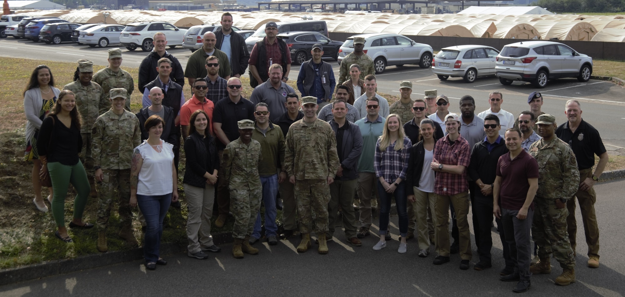 Col. Terrence M. Joyce, Office of Special Investigations Field Investigations Region 5 Commander, center in front row, is joined by members of one of the two 5 FIR Screening Teams assembled at Ramstein Air Base, Germany, to support Operation Allies Refuge. (Photo submitted by 5 FIR)