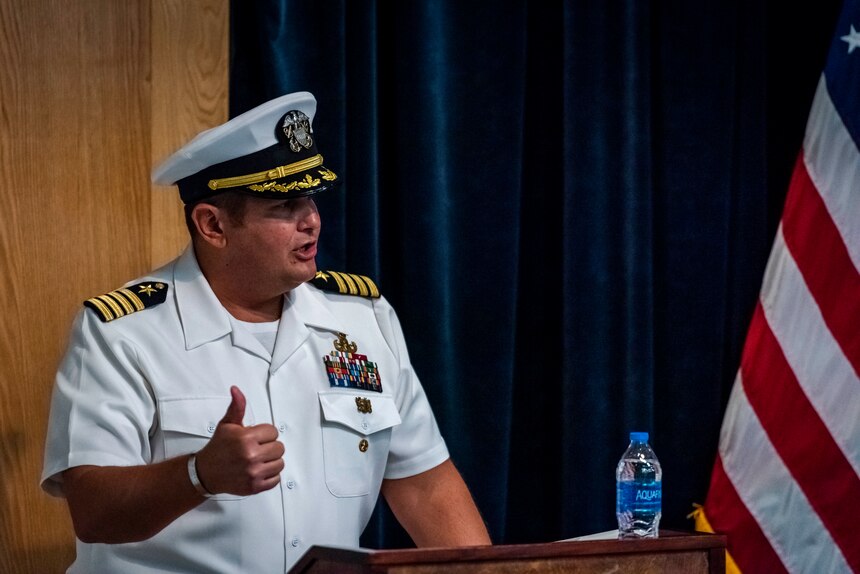 Capt. Dean Muriano, commanding officer, Center for Explosive Ordnance Disposal and Diving (CEODD), delivers remarks after relieving Capt. Keith Dowling during a change of command ceremony, Sept. 22.