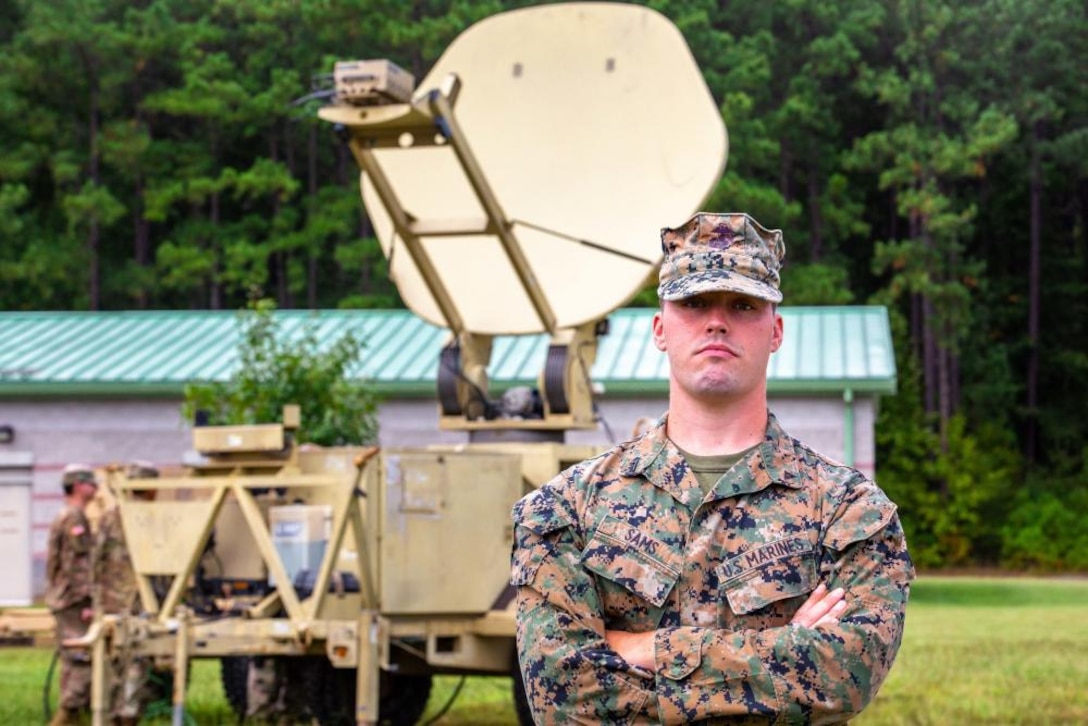 U.S. Marine Corps Lance Cpl. Dylan Sams, a Wideband Satellite Systems Maintainer assigned to 26th Marine Expeditionary Unit, is titled Motivator of the Week for his dedicated work ethic and technical proficiency during Operation Allies Welcome on Fort Pickett, Virginia, Sept. 22, 2021. “I really believe I am just doing my job,” Sams said. “I help people and when I see that something needs to get done, I get it done.” According to his leadership, Sams conducted over 60 hours of troubleshooting on four satellite transmissions systems while also identifying multiple faults on satellite communication systems. Sams also assisted the U.S. Army 62nd Expeditionary Signal Brigade in getting their system online in support of 1st Battalion, 506th Infantry Regiment. (U.S. Marine Corps photo by Cpl. Eric Ramirez)