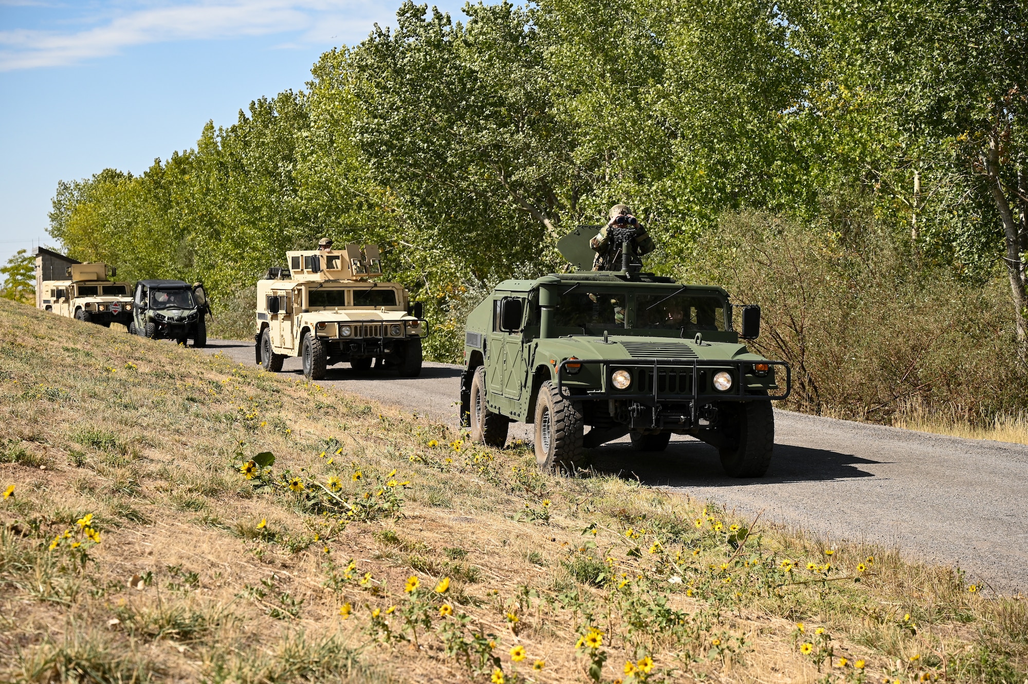 Defenders with the 75th Security Forces Squadron conduct convoy operations during a readiness exercise at Hill Air Force Base, Utah, Sept. 23, 2021. Squadrons from the 75th Air Base Wing participated in a phase II readiness exercise where they were assessed while performing tasks in an austere environment. (U.S. Air Force photo by R. Nial Bradshaw)