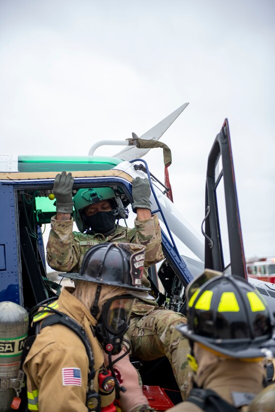 The 1st Helicopter Squadron along with firefighters from the 316th Civil Engineer Squadron held a live rescue and egress training on the flightline, Sept. 16, 2021.