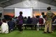 Afghan evacuees get ready to watch a movie set up by the Department of Homeland Security as a recreational activity in support of Operation Allies Welcome on Holloman Air Force Base, New Mexico, Sept. 20, 2021. The Department of Defense, through the U.S. Northern Command, and in support of the Department of State and Department of Homeland Security, is providing transportation, temporary housing, medical screening, and general support for at least 50,000 Afghan evacuees at suitable facilities, in permanent or temporary structures, as quickly as possible. This initiative provides Afghan evacuees essential support at secure locations outside Afghanistan. (U.S. Army photo by Spc. Nicholas Goodman)
