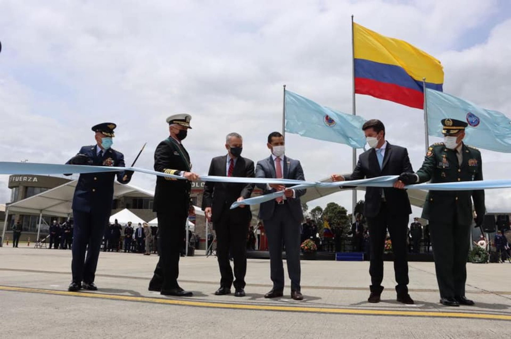 U.S. Navy Adm. Craig S. Faller, commander of U.S. Southern Command, takes part in a ceremony as the U.S. donates two C-130H Hercules aircraft to Colombia’s Military Air Transport Command.