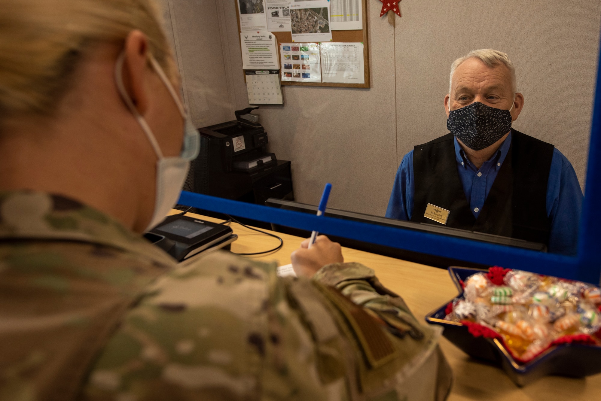Airman checks in at the front desk