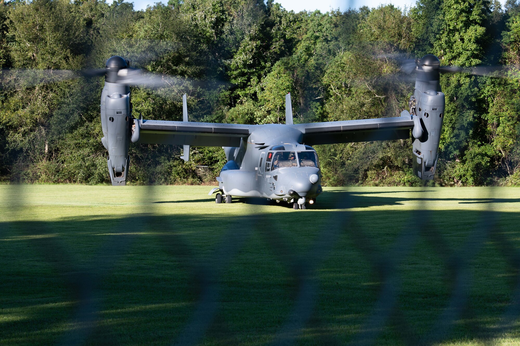 A CV-22B Osprey tiltrotor aircraft lands at the campus of Florida State University during a diversity and inclusion event hosted by administration and Air Force Special Operations Command Sept. 23, 2021. The aircraft is lauded for its ability to fly long distances and maintain a high level of maneuverability in landing and takeoffs. (U.S. Air Force photo by Staff Sgt. Rito Smith)