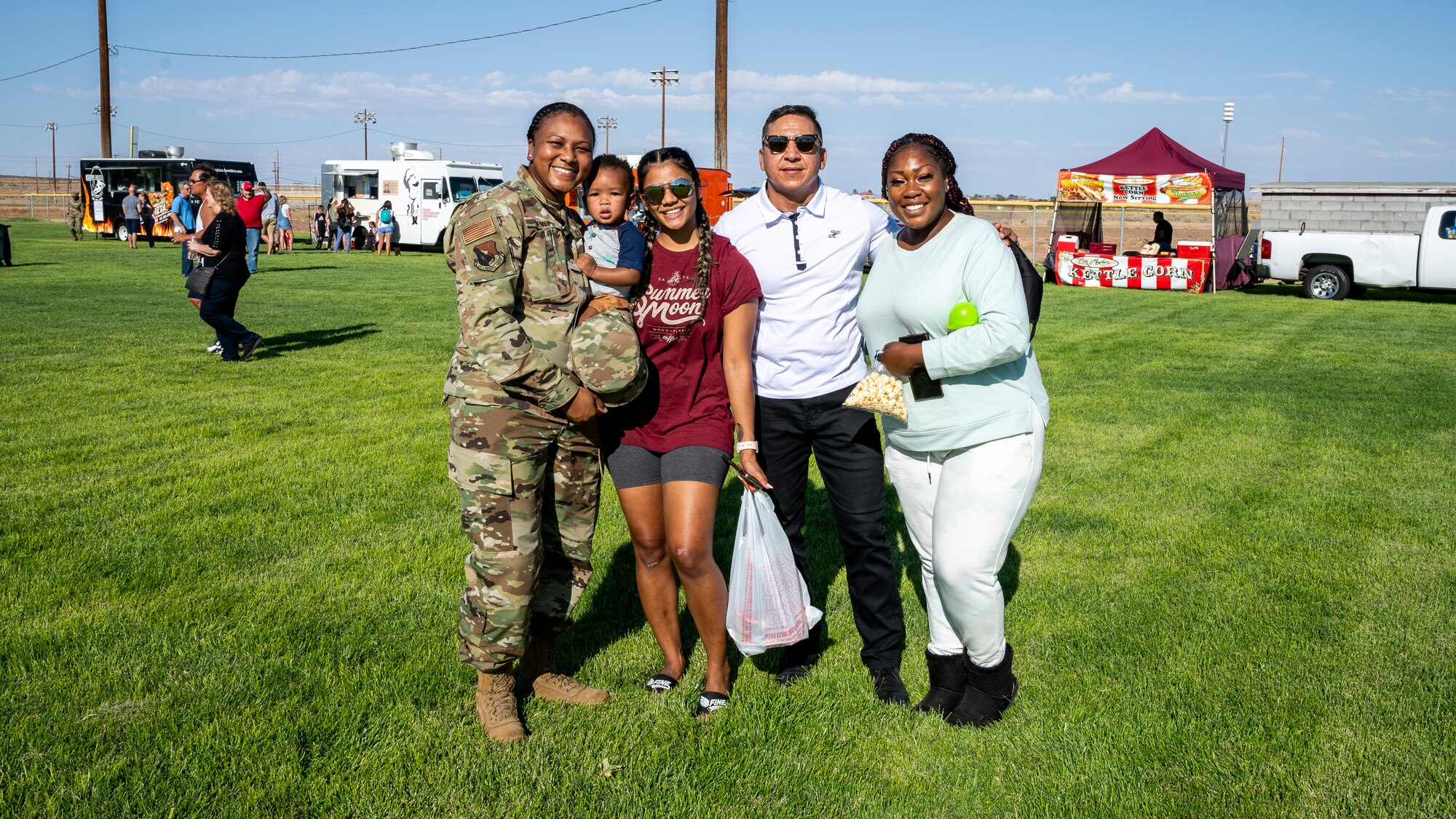 Team Edwards and family members enjoy a picnic in celebration of the Air Force's 74th birthday at Wings Field on Edwards Air Force Base, California, Sept. 17. (Air Force photo by Katherine Franco)