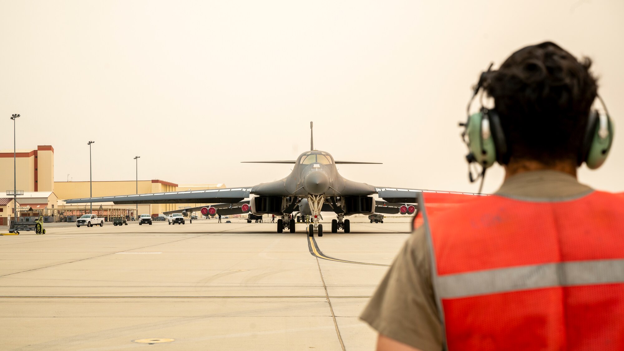 Ground crews prepare a B-1B Lancer, tail number 85-0074, for its final flight out of Edwards Air Force Base, California, Sept. 23.