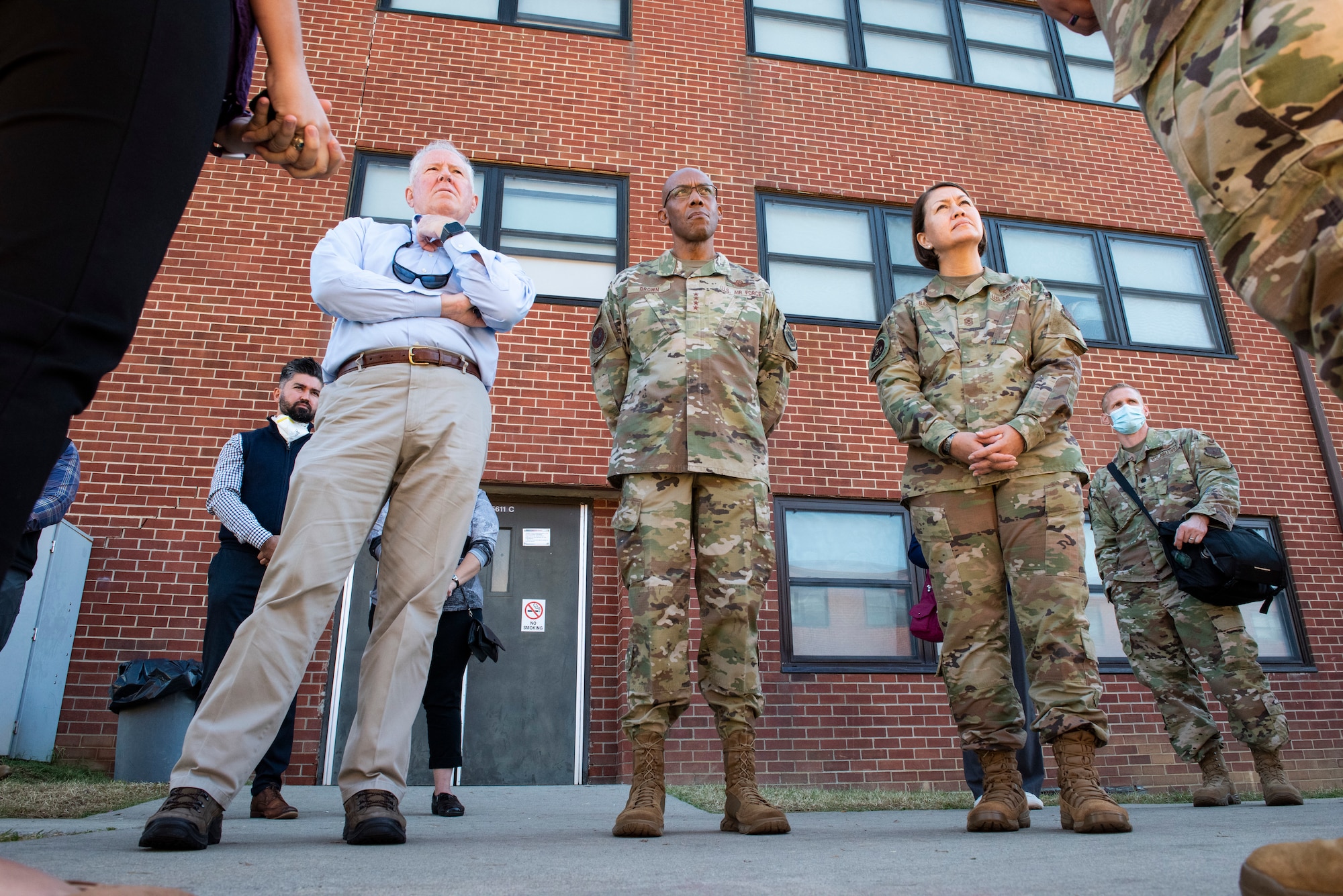 Secretary of the Air Force Frank Kendall, Chief of Staff of the Air Force Gen. CQ Brown, Jr. and Chief Master Sergeant of the Air Force JoAnne Bass, receive a briefing detailing life inside Liberty Village during a visit to Joint Base McGuire-Dix-Lakehurst, New Jersey, Sept. 25, 2021. The Department of Defense, through U.S. Northern Command, and in support of the Department of Homeland Security, is providing transportation, temporary housing, medical screening, and general support for at least 50,000 Afghan evacuees at suitable facilities, in permanent or temporary structures, as quickly as possible. This initiative provides Afghan personnel essential support at secure locations outside Afghanistan. (U.S. Air Force photo by Staff Sgt. Jake Carter)
