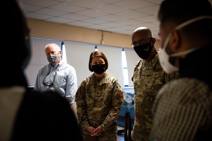 Secretary of the Air Force Frank Kendall, Chief Master Sergeant of the Air Force JoAnne Bass and Chief of Staff of the Air Force Gen. CQ Brown, Jr., speak with Afghans staying in Liberty Village while visiting Joint Base McGuire-Dix-Lakehurst, New Jersey, Sept. 25, 2021. The Department of Defense, through U.S. Northern Command, and in support of the Department of Homeland Security, is providing transportation, temporary housing, medical screening, and general support for at least 50,000 Afghan evacuees at suitable facilities, in permanent or temporary structures, as quickly as possible. This initiative provides Afghan personnel essential support at secure locations outside Afghanistan. (U.S. Air Force photo by Staff Sgt. Jake Carter)