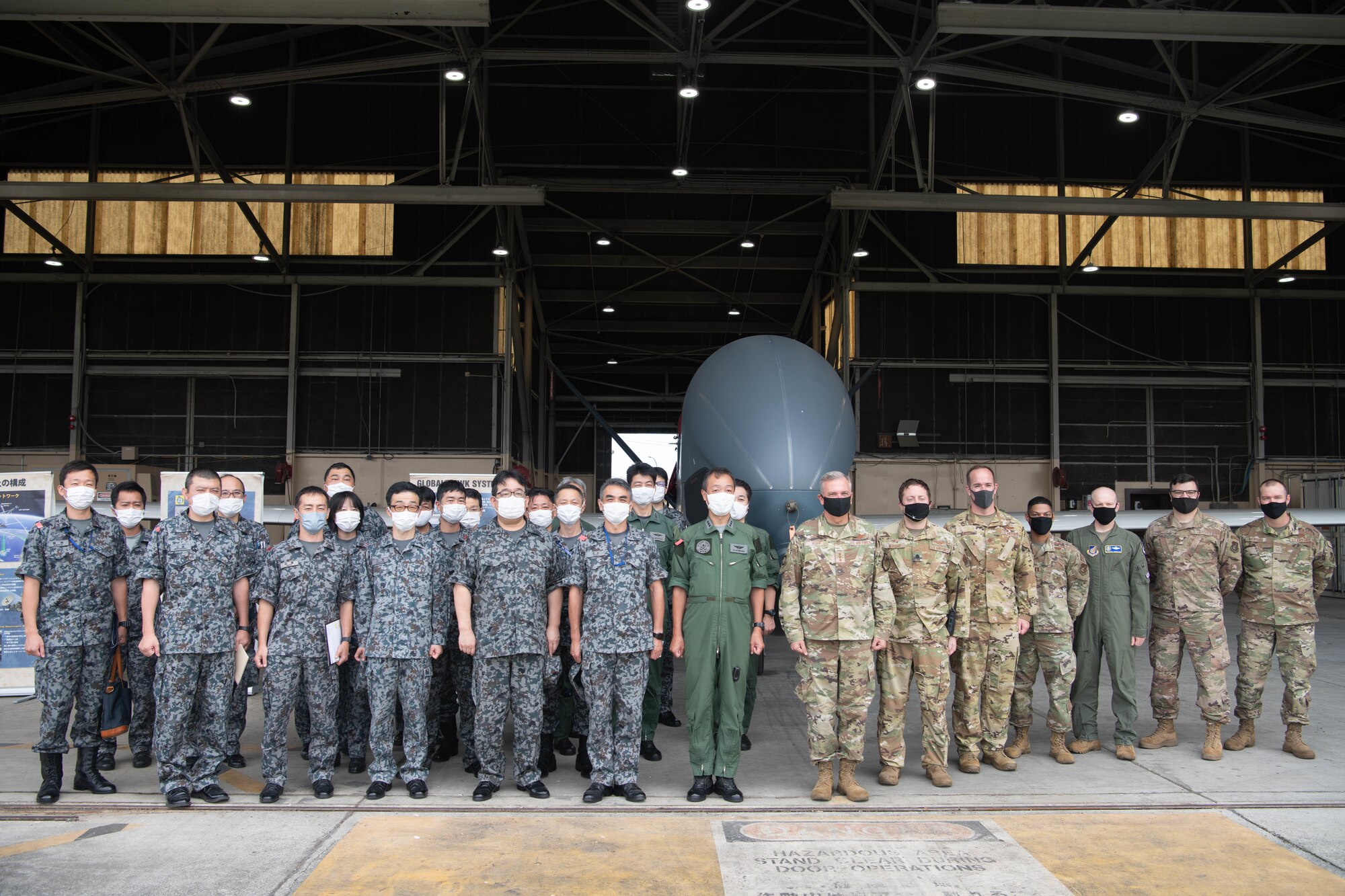 embers of Air Defense Command visited the 319th Operations Group Det. 1, for a U.S. Air Force Global Hawk subject matter expert exchange at Yokota Air Base, Japan, Sept. 22, 2021