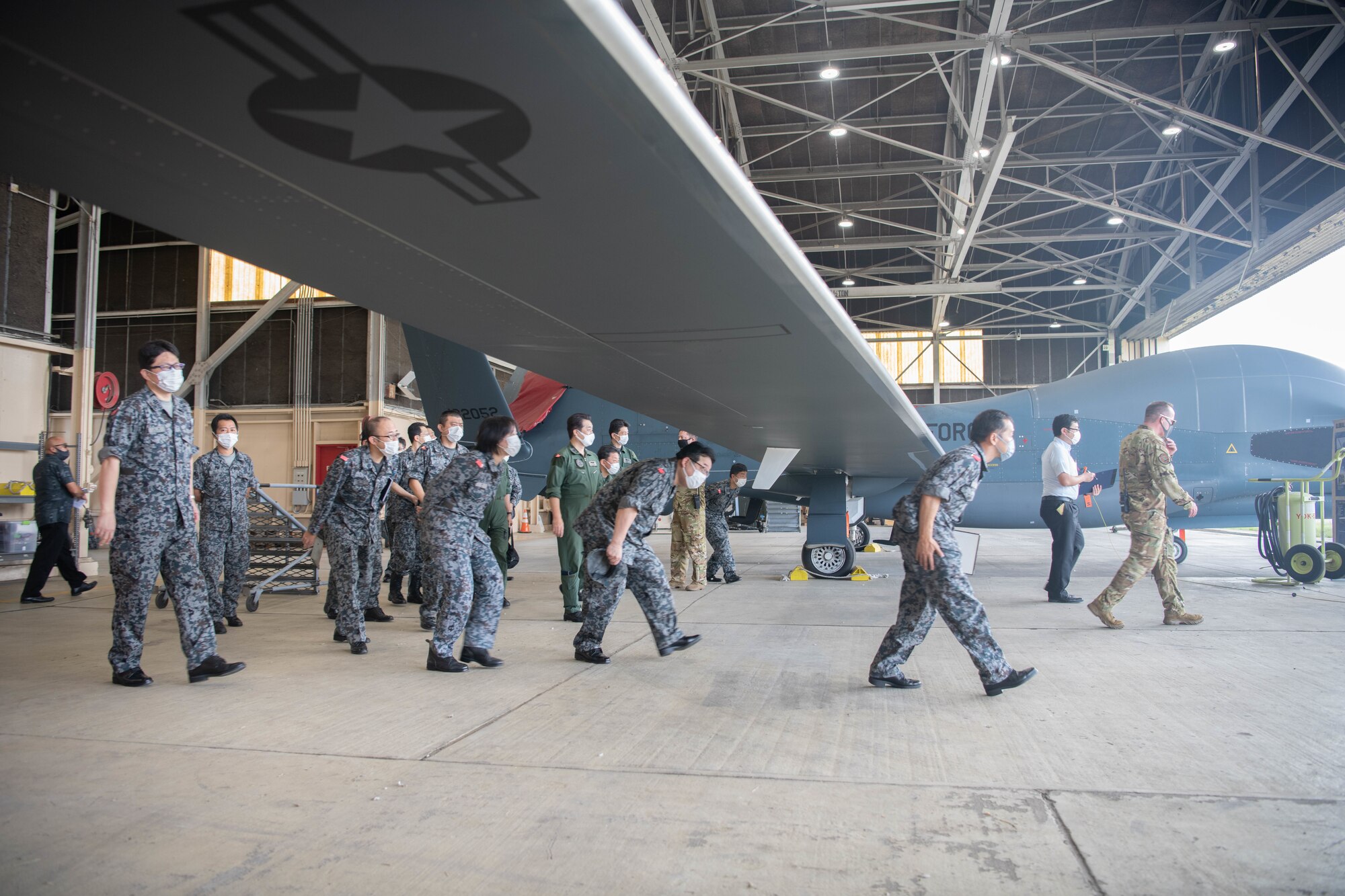 embers of Air Defense Command visited the 319th Operations Group Det. 1, for a U.S. Air Force Global Hawk subject matter expert exchange at Yokota Air Base, Japan, Sept. 22, 2021