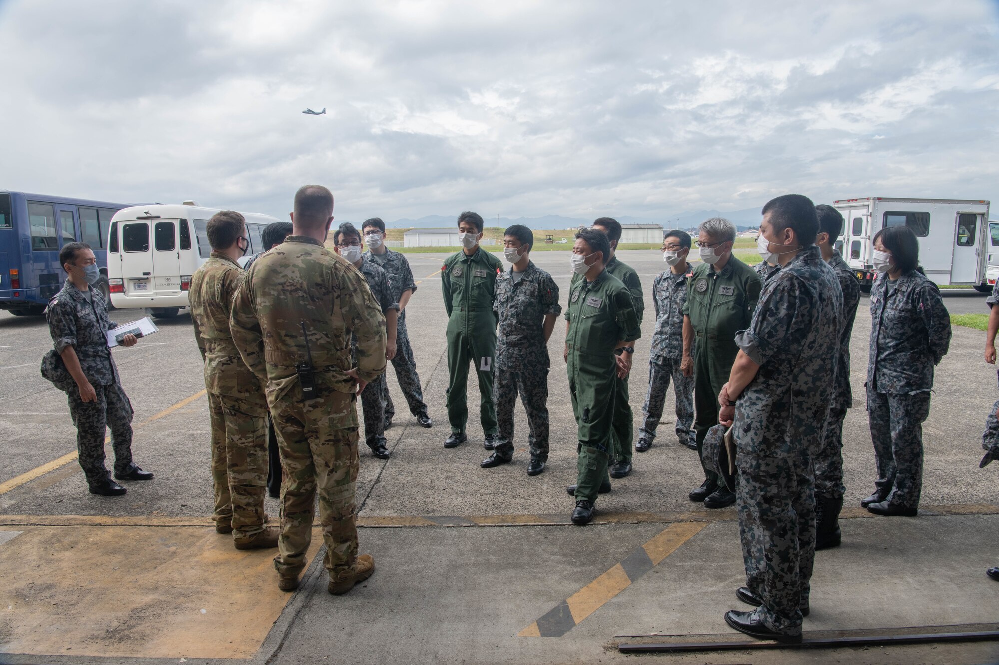 Members of Air Defense Command visited the 319th Operations Group Det. 1, for a U.S. Air Force Global Hawk subject matter expert exchange at Yokota Air Base, Japan, Sept. 22, 2021.