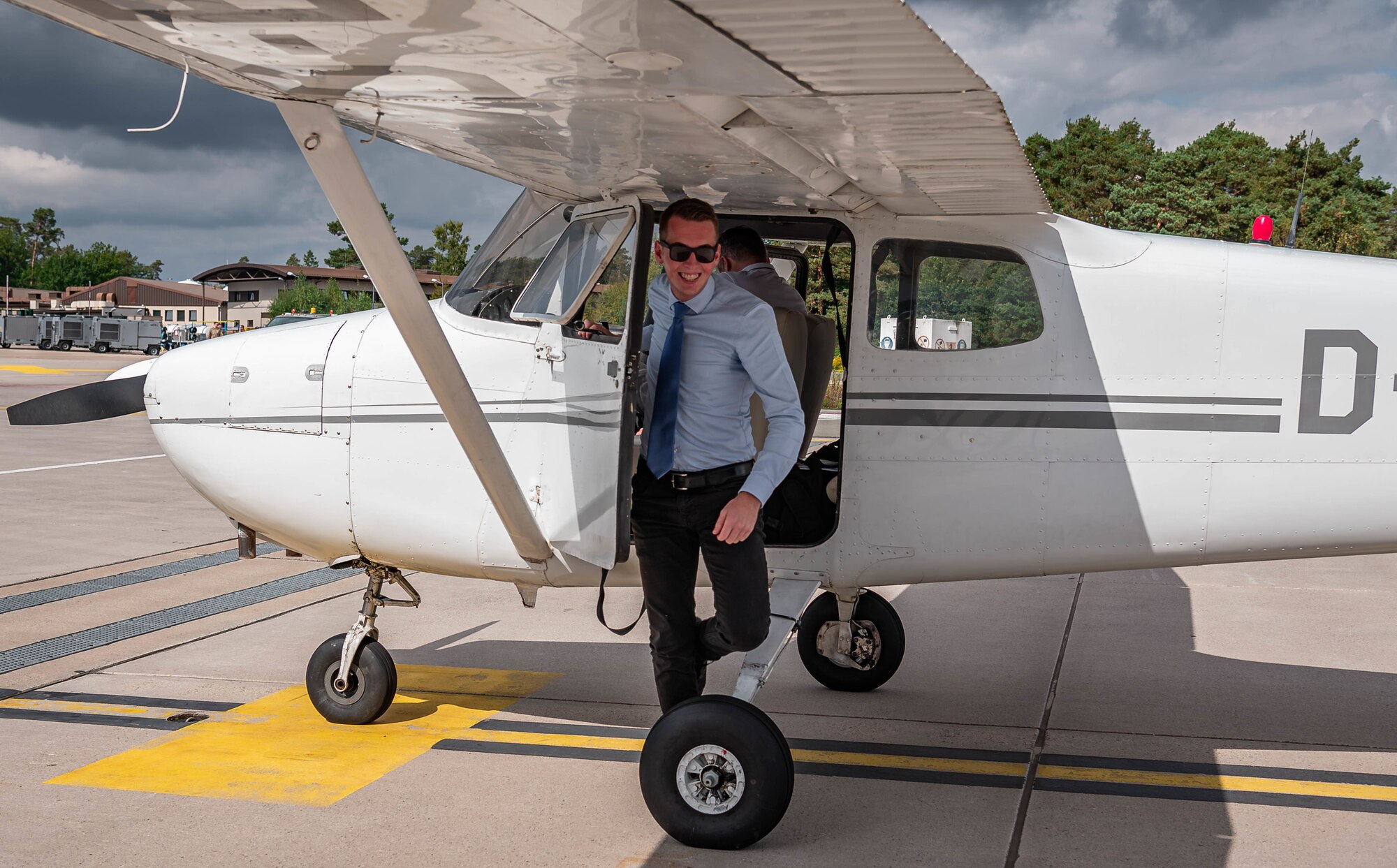 Trainer departs trainer aircraft.