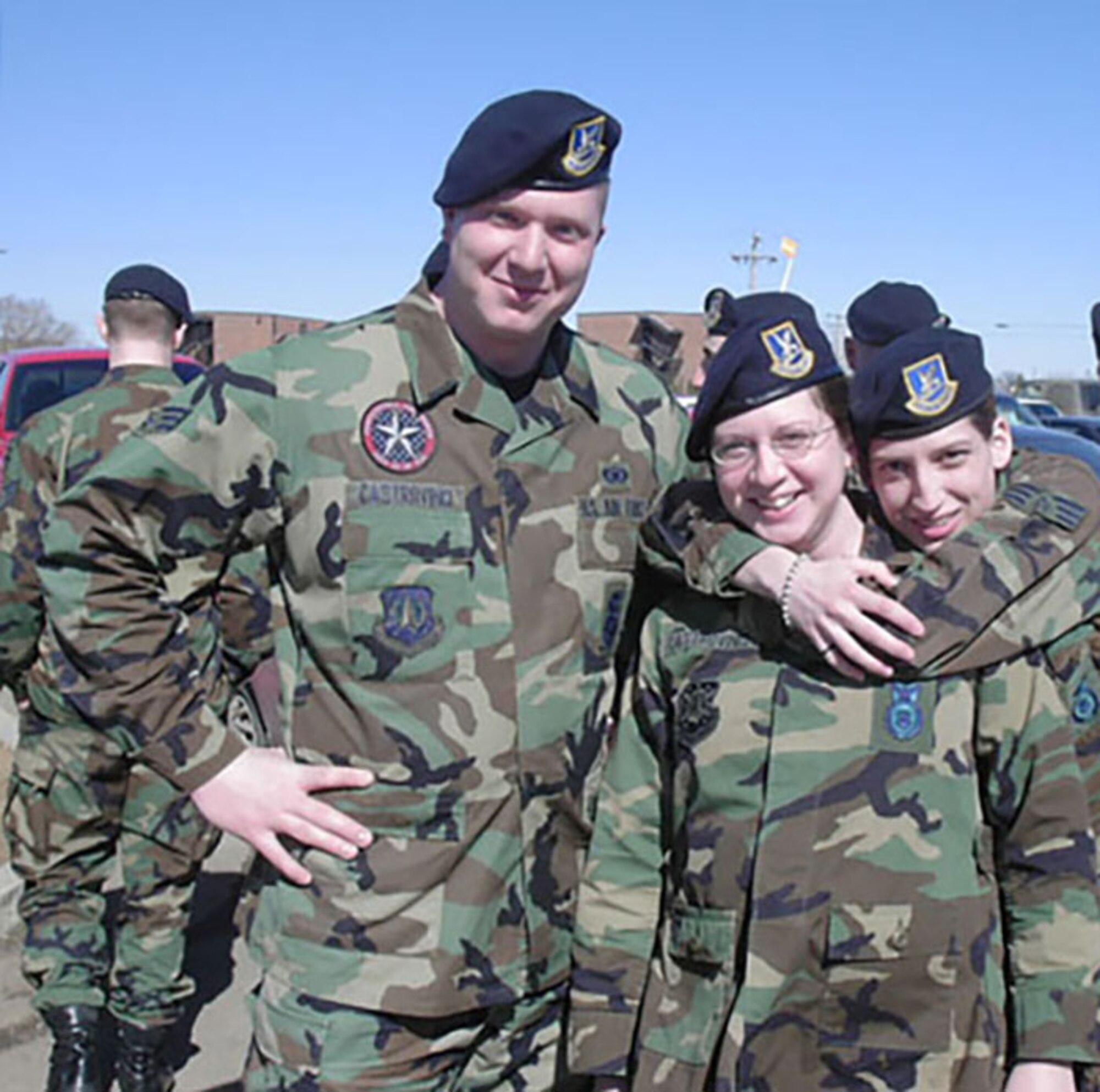 U.S. Air Force Senior Airman Scott Castrovinci, left, and Senior Airman  Rachel Castrovinci, center, met while stationed at Minot Air Force Base, North Dakota, in  2001. The couple, now a chief master sergeant and a senior master sergeant, worked in the  740th Missile Squadron on Sept. 11, 2001. Senior Master Sgt. Castrovinci has since cross trained to airfield management and the pair shared their memories and story for the 20th anniversary of 9/11. (Courtesy photo)
