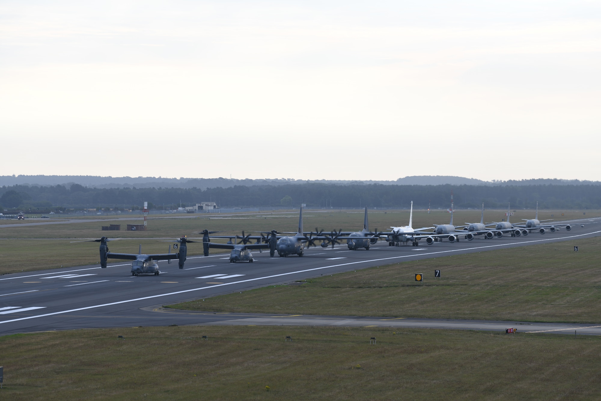 Team Mildenhall aircraft participate in an “elephant walk” at Royal Air Force Mildenhall Sept. 13, 2021. An elephant walk is a term used by the U.S. Air Force when multiple aircraft taxi together before takeoff. (U.S. Air Force photo by Senior Airman Antonia Herrera)
