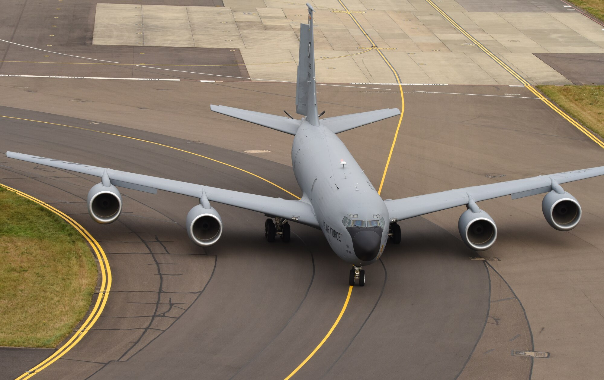 A U.S. Air Force KC-135 Stratotanker aircraft from the 100th Air Refueling Wing taxis past the air traffic control tower as part of an elephant walk during Exercise High Life at Royal Air Force Mildenhall, England, Sept. 13, 2021. The elephant walk signaled the exercise at Royal Air Force Fairford, and Team Mildenhall demonstrated elements of Agile Combat Employment to show they are ready any time, anywhere, and that agility, deterrence and resiliency are essential to defense and operational capability in a contested environment. (U.S. Air Force photo by Karen Abeyasekere)