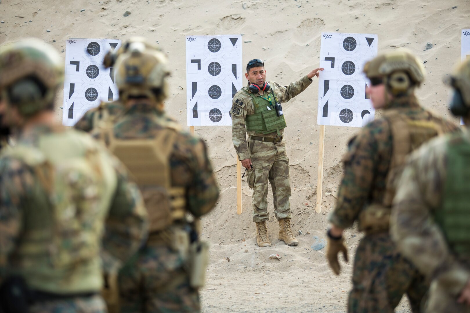 U.S. and Peruvian Marines conduct live fire training.