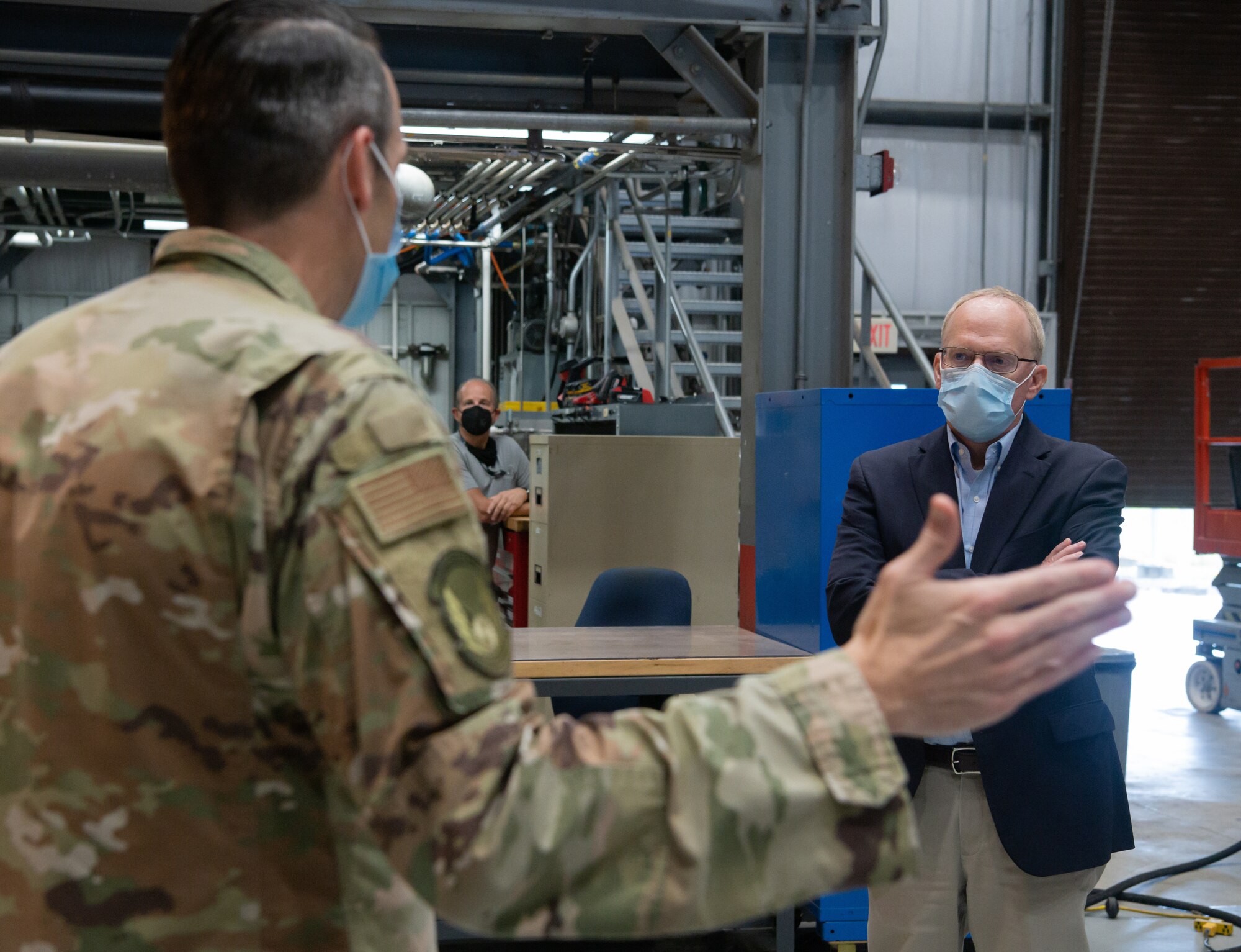 Rep. John Rose, of Tennessee, listens to Lt. Col. Lane Haubelt, chief of the Propulsion Test Branch, Test Division, Arnold Engineering Development Complex (AEDC), speak about the engine test capabilities the branch operates during the representative's visit to Arnold Air Force Base, Tenn., headquarters of AEDC, Aug. 31, 2021. Across the test cells on the base, the branch can support test and evaluation of performance, operability, aeromechanical, icing, corrosion, inlet pressure and temperature distortion, accelerated mission testing, engine-inlet dynamics, mission simulations and engine component testing. (U.S. Air Force photo by Jill Pickett)
