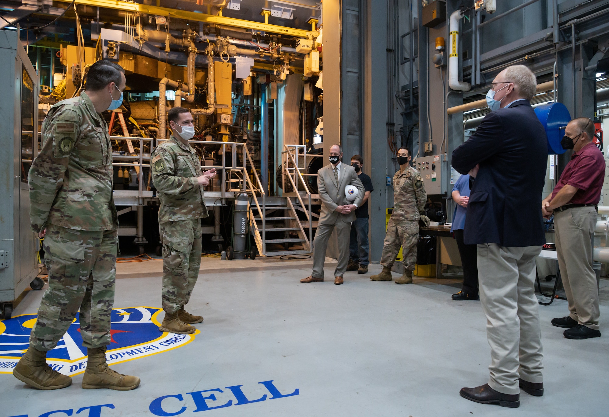 1st Lt. Adam Doyle, second from left, a test manager in the Propulsion Test Branch, Test Division, Arnold Engineering Development Complex (AEDC), briefs Rep. John Rose, of Tennessee, about the engine testing conducted using the Sea Level Test Cell 3 (SL-3) as they tour the facility during the representative's visit to Arnold Air Force Base, Tenn., headquarters of AEDC, Aug. 31, 2021. An F135, the engine that powers the F-35 Joint Strike Fighter, is currently installed in SL-3 for accelerated mission testing. (U.S. Air Force photo by Jill Pickett)