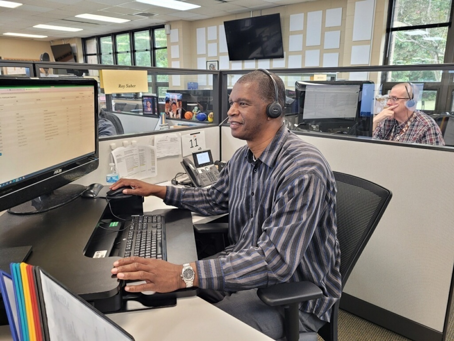 Roy Suber, an education counselor with the Navy College Virtual Education Center (NCVEC), assists a Sailor over the phone with his education needs. Navy College Program counselors are available to assist Sailors on their education journey by calling the 24-hour, toll-free MyNavy Career Center phone number: 1-833-330-MNCC. To reach the NCVEC, select 